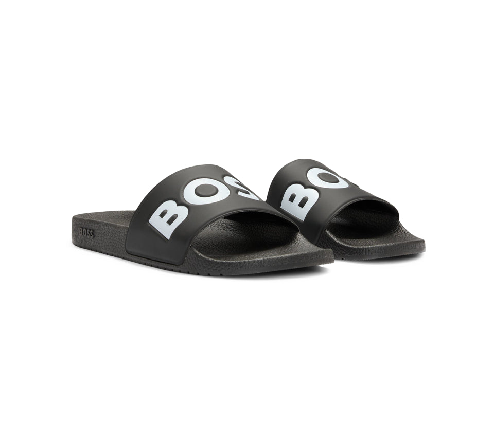 Vivi Sports Hugo Boss Aryeh Slides – Men's Slip-On Sandals in Black, UK Sizes 7 to 11 – Lightweight and Water-Resistant Design with Contoured Footbed for Comfort – Ideal for Poolside, Casual Wear, Holidays, or Everyday Summer Style